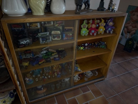 Small wooden display cabinet with glass sliding door