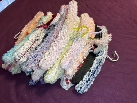 Coat hangers with handmade cover covers