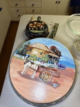 Two frying pans hand painted by Shirley a Cole