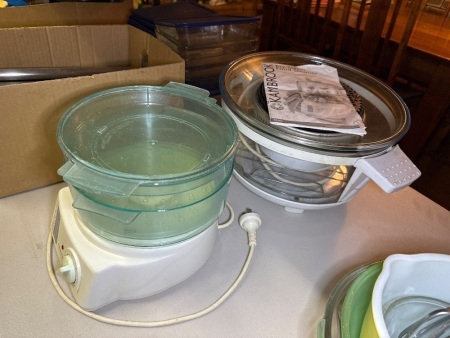 Two food steamers