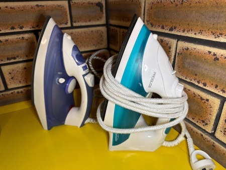 Two clothes irons