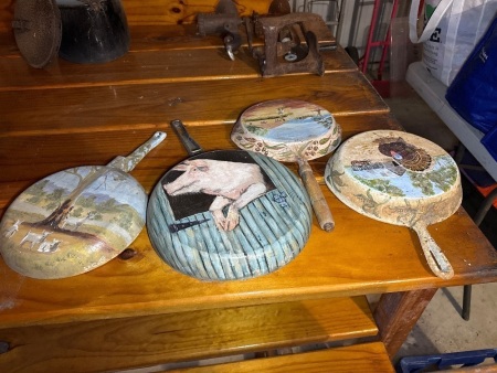 4 frypans painted by Shirley Cole