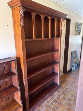 Tall wooden bookshelf