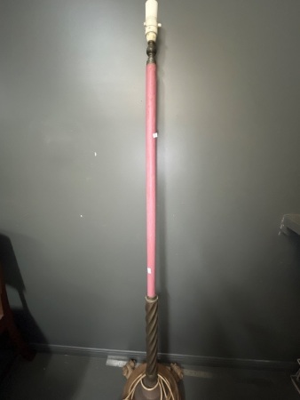 Vintage-Style Floor Lamp Featuring Dark Wood and a Twist Pole