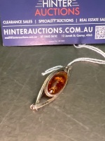 Sterling Silver Brooch with Natural Amber