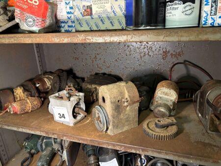 Shelf lot of magnetos etc