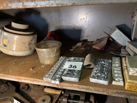 Shelf lot of sinker moulds etc