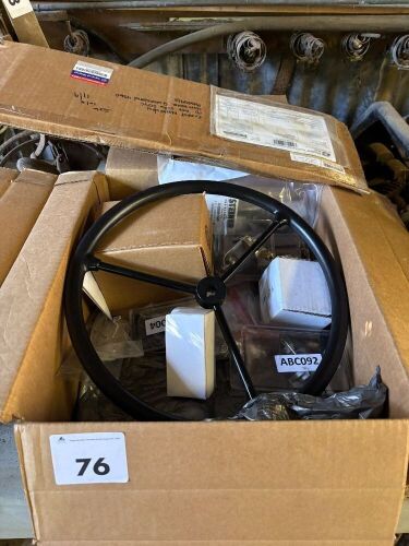 Box of new tractor parts