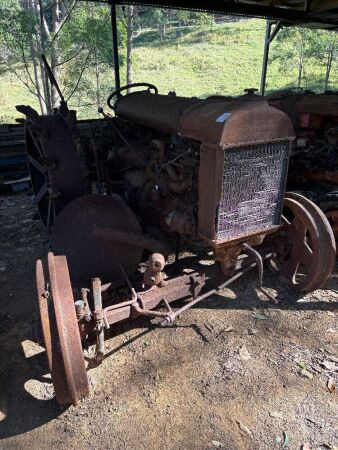 Vintage FORDSON tractor with mounted disk plow