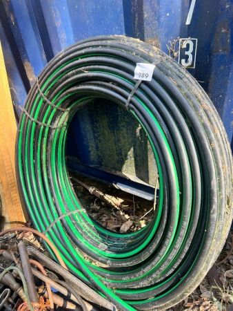 Roll of green fat stripe 1in poly pipe