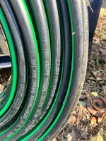 Roll of green fat stripe 1in poly pipe - 2
