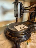 JONES hand cranked sewing machine on paw foot cast iron base - 4