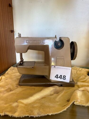 Unbranded miniature sewing machine