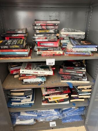3 shelves of mostly true crime books