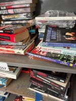 3 shelves of mostly true crime books - 3