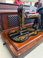 SINGER shuttle sewing machine with case - 2