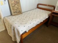 Single wooden bed