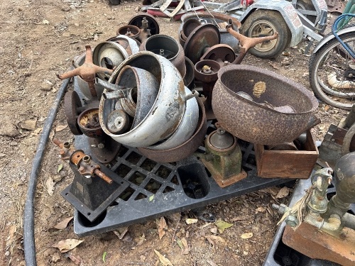 Pallet of assorted cream separator bodies, parts, and accessories