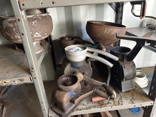 2 shelves of assorted cream separator bodies and parts