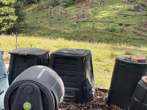 2x square on ground compost bins