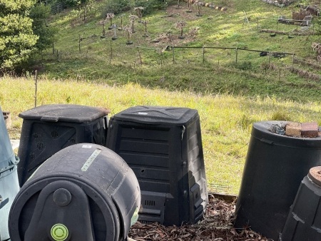 2x square on ground compost bins