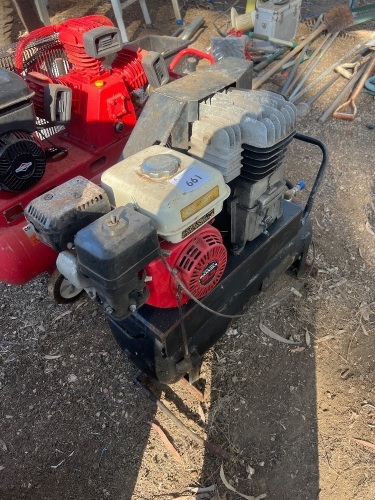 Single cylinder air compressor powered by a 5HP Honda petrol motor