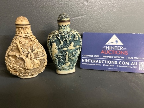 Pair of Carved Asian Snuff Bottles