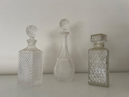 Trio of Vintage Clear Glass Decanters with Textured Patterns