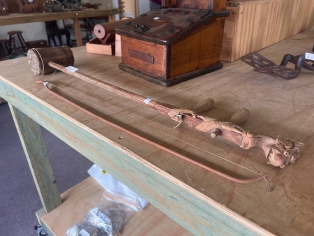 Hand-Carved Wooden String Instrument with bow