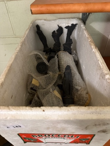 Box of black painted pottery chess pieces