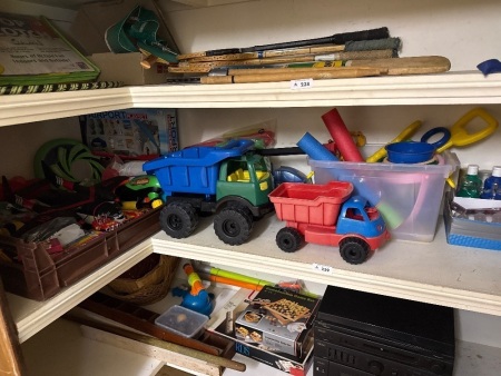 Shelf lot of mixed toys