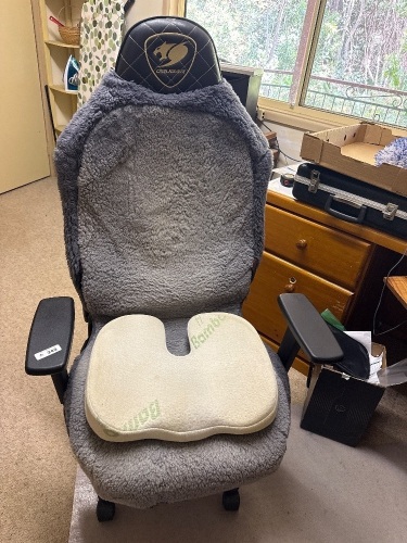 Leather look office chair with sheepskin cover
