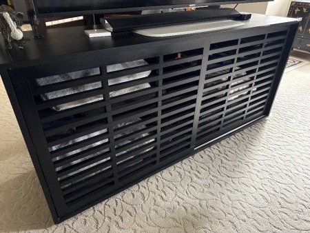 Wooden veneer cabinet with sliding doors