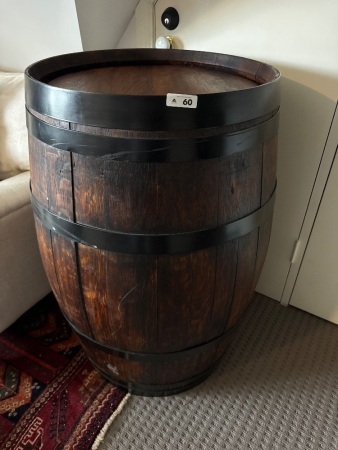 Wine barrel with metal bands and stand