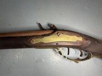 Antique Warrenter flintlock rifle with incised brass decorative fittings on the butt - 2