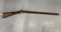 Antique Warrenter flintlock rifle with incised brass decorative fittings on the butt - 7