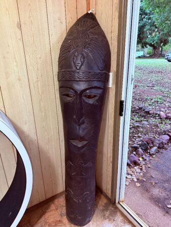 Hand-carved wooden tribal mask or sculpture