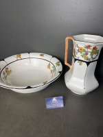 J and G Meakin Sol floral earthenware jug and plate