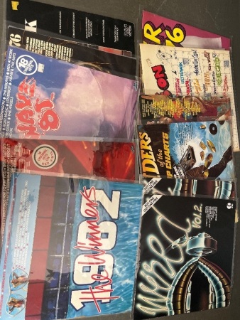 Assorted records including Red Alert, Explosive hits 76, Raiders of the pop charts, Urban chipmunk
