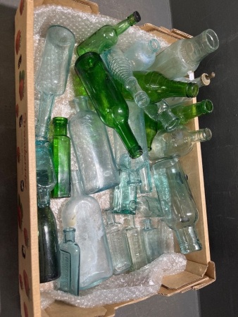 Assorted lot of green glass bottles