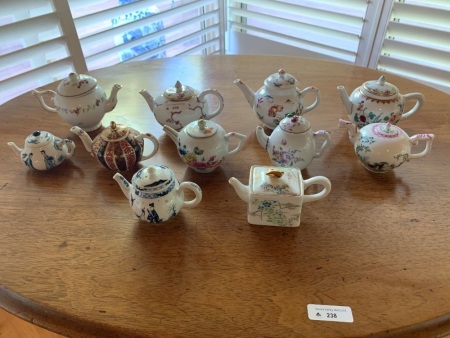 Collection of 11 Victoria and Albert Museum Reproduction Teapots