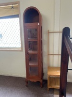 Tall arched timber display cabinet with glazed door and side panels