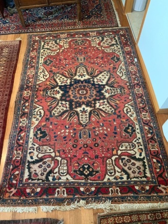 Vintage Hand Knotted Persian Wool Rug - Red and Blue with Floral Designs & Central Rosette