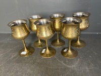 Set of six engraved brass stemmed goblets