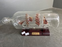 HMS Discovery ship in bottle on stand - 2