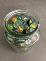 Glass jar of assorted marbles - 4