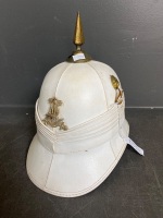 White pith helmet Band Corps badge