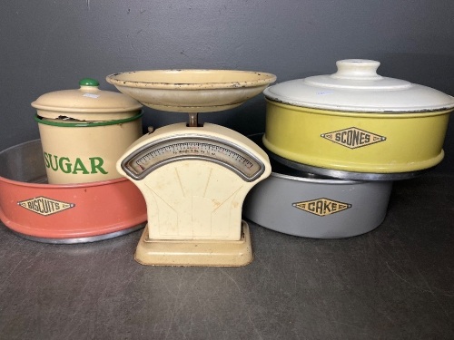 Anodized Kitchen Scales, Set of Canisters and a Stack of Cake Tins
