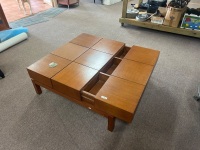Modern square coffee table with hidden storage