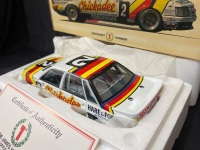 1986 Holden Commodore VK# 2 Allan Grice / Graeme Bailey - Winner James Hardie 1000 - 0056 / 3900 - Biante B182704B - Certificate Signed Alan Grice & Graeme Bailey - 3